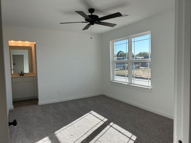 Large secondary bedroom with a Jack-n-Jill bath