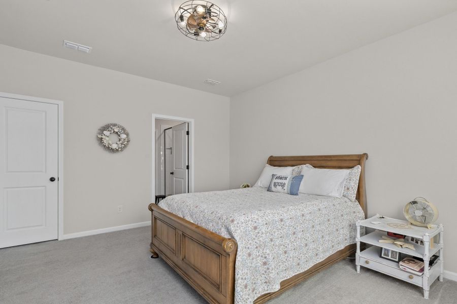 Furnished interior view inside a new home in K. Hovnanian's® Four Seasons at Lakes of Cane Bay, Summerville (Image 16). Furnished interior view inside a new home in K. Hovnanian's® Four Seasons at Lakes of Cane Bay, Summerville (Image 16).