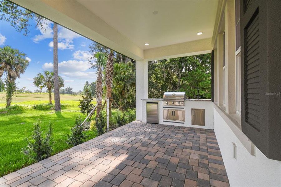 Exterior details and patio area of a home in Southern Hills Plantation, Brooksville (Image 28).