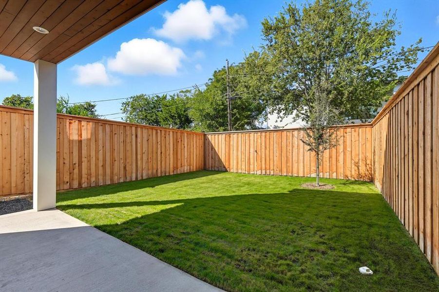 Fenced backyard featuring a patio Fenced backyard featuring a patio