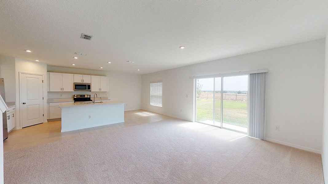 Representative unfurnished interior of a home built from the Azalea by Taylor Morrison in Riverfront, Edgewater (Image 10).