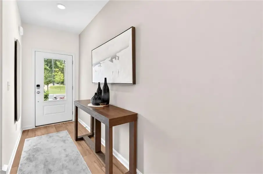 Furnished interior view inside a new home in Towns at Holly Springs, Holly Springs (Image 7). Furnished interior view inside a new home in Towns at Holly Springs, Holly Springs (Image 7).