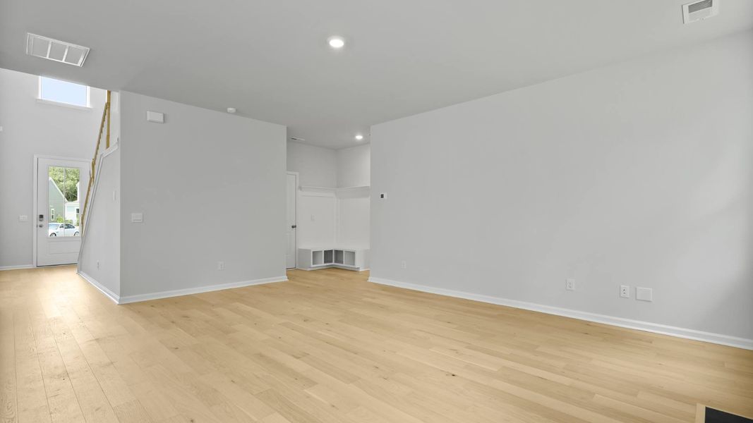 Representative unfurnished interior of a home built from the FORRESTER by D.R. Horton in Founders Corner, Summerville (Image 12).