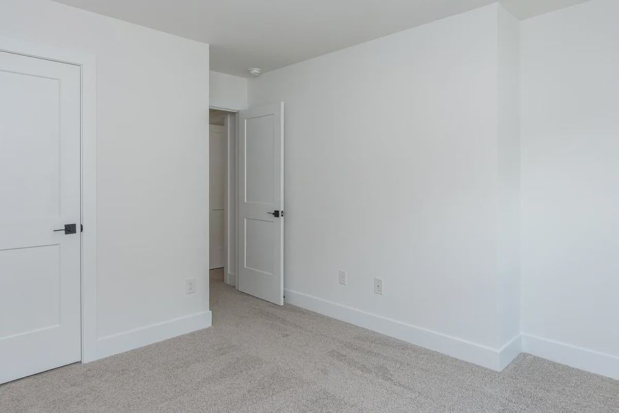 Representative unfurnished interior of a home built from the 1808 Townhome by Adams Homes in Parkstone Place Townhomes, Roebuck (Image 21). Representative unfurnished interior of a home built from the 1808 Townhome by Adams Homes in Parkstone Place Townhomes, Roebuck (Image 21).