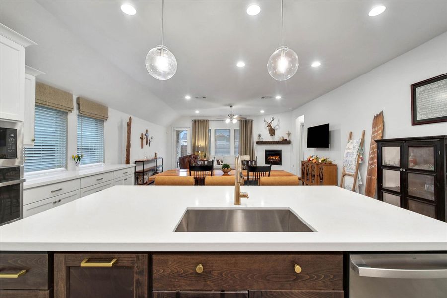 Positioned between the kitchen island & family room, the dining area keeps everyone connected—whether preparing a meal, enjoying dinner or relaxing together.