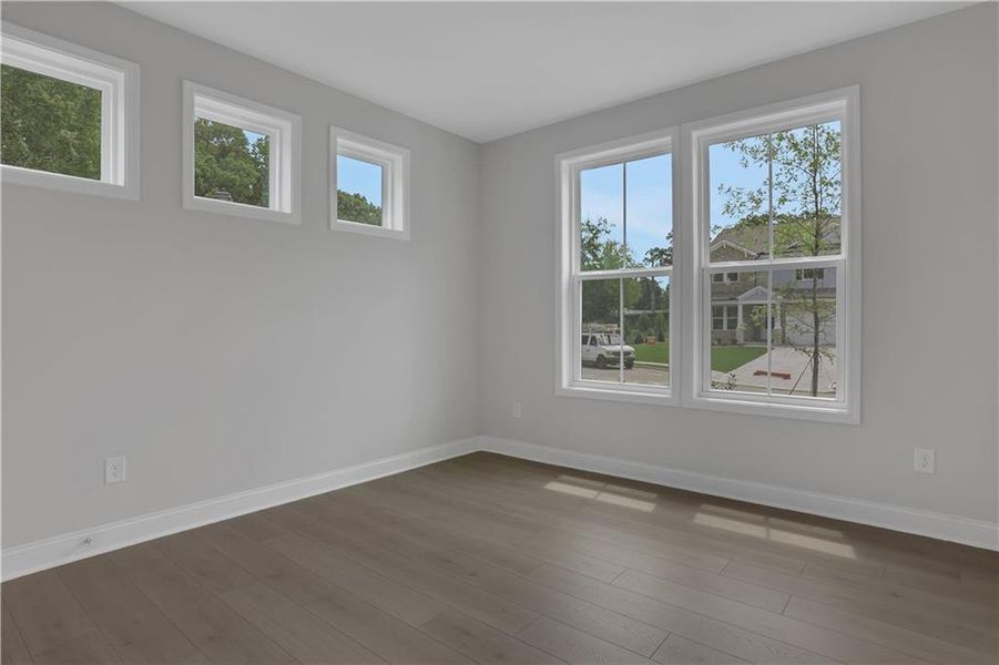 Spacious, unfurnished interior of a new home in The Paddocks at Doc Hughes, Buford (Image 42).