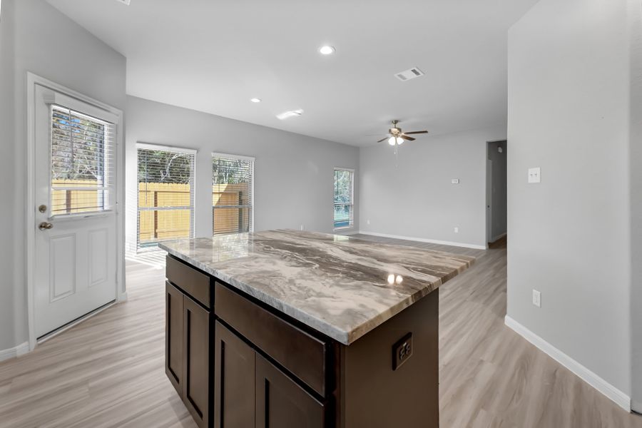 Representative furnished interior of a home built from the Floor Plan 1243 by Colina Homes in River Ranch, Dayton (Image 16).
