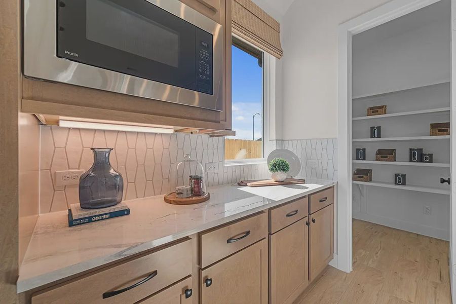 Furnished interior view inside a new home in Blue Heron, Mont Belvieu (Image 32).