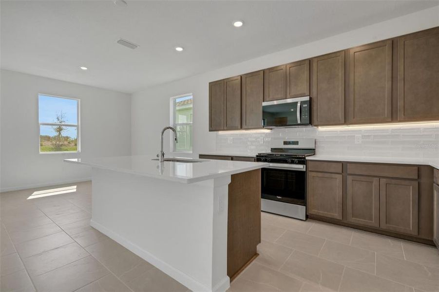 Furnished interior view inside a new home in Brystol North at Wylder, Port St. Lucie (Image 10).