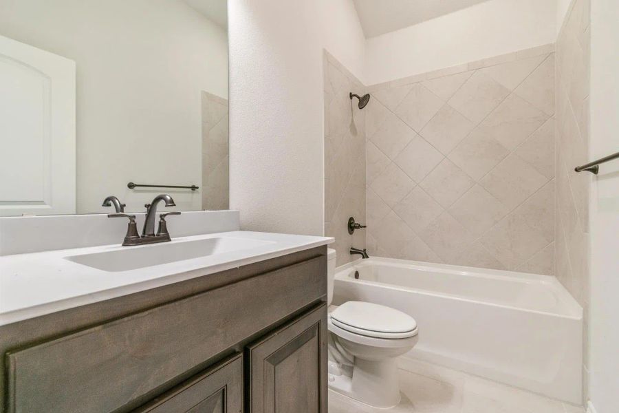 Bathroom | Concept 1841 at Coyote Crossing in Godley, TX by Landsea Homes