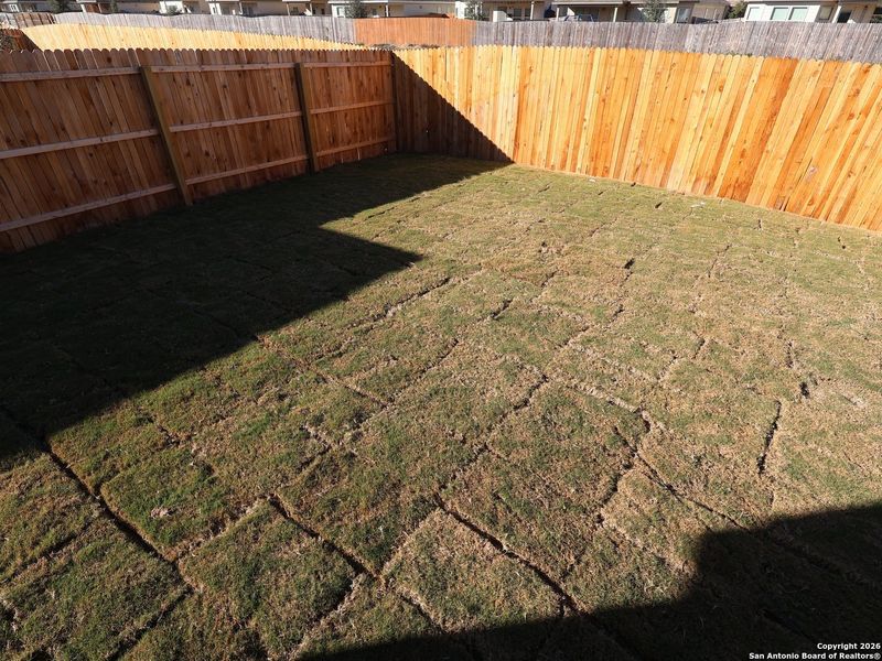Exterior details and patio area of a home in Winding Brook, San Antonio (Image 21).