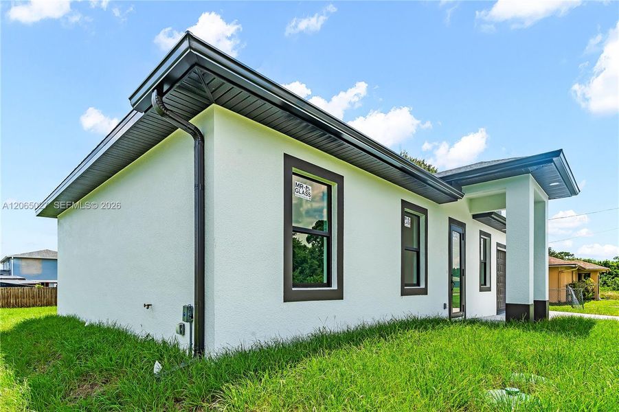 Exterior details and patio area of a home in , Lehigh Acres (Image 3). Exterior details and patio area of a home in , Lehigh Acres (Image 3).
