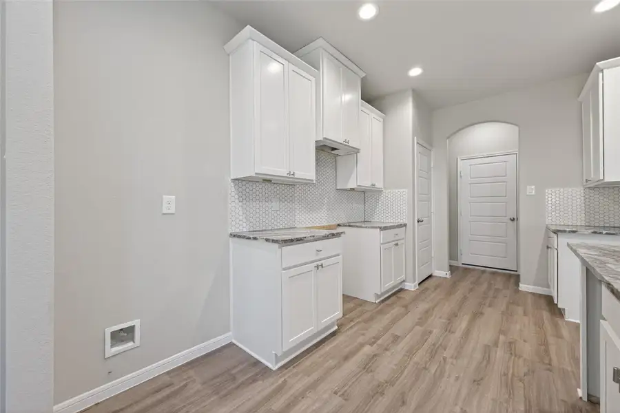 Furnished interior view inside a new home in Woodland Lakes, Houston (Image 7).