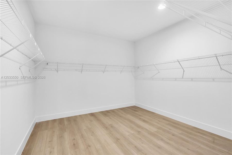 1 of 2 Primary walk-in closets 1 of 2 Primary walk-in closets