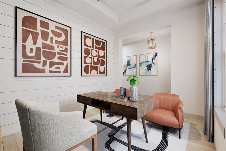 Office space with light wood-style flooring