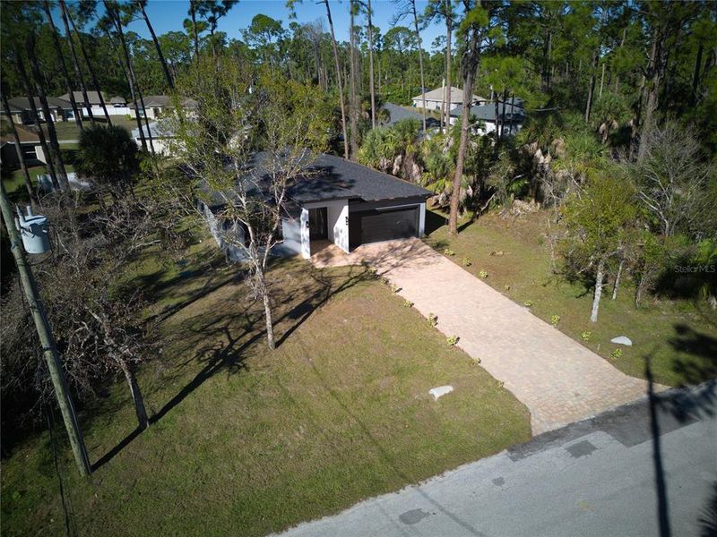 Front exterior of a new home in , North Port, FL, highlighting curb appeal (Image 17).