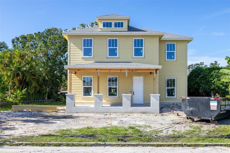 Front exterior of a new home in , St. Petersburg, FL, highlighting curb appeal (Image 8).