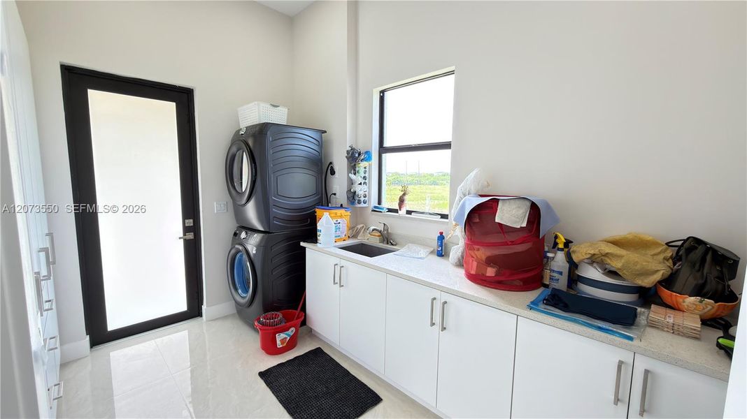 Furnished interior view inside a new home in , Loxahatchee (Image 48).
