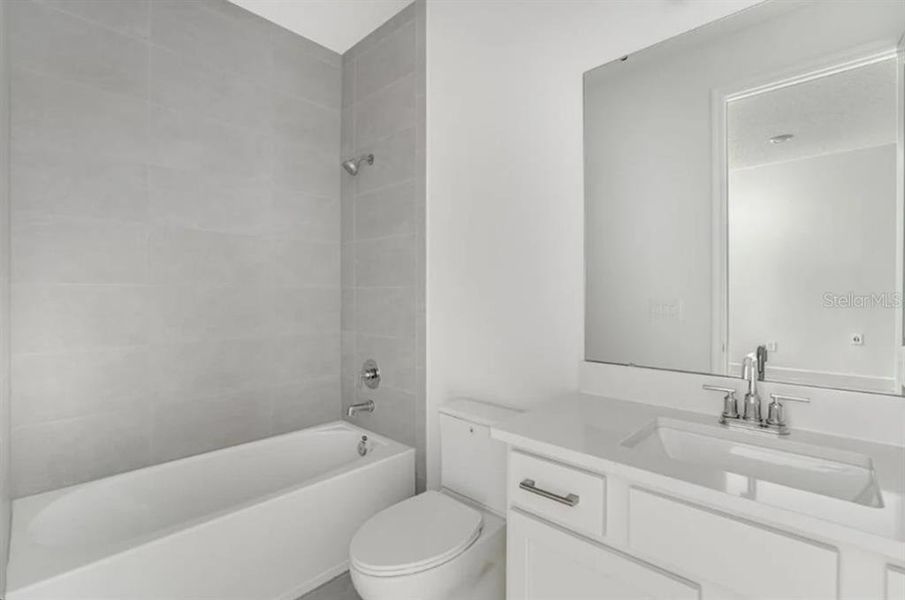 Furnished interior view inside a new home in Harvest at Ovation, Winter Garden (Image 10).