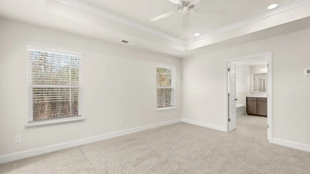 Representative unfurnished interior of a home built from the Hampshire by D.R. Horton in Heritage Pointe, Senoia (Image 32).