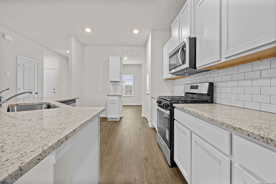 Furnished interior view inside a new home in Redbird Ranch, San Antonio (Image 7).