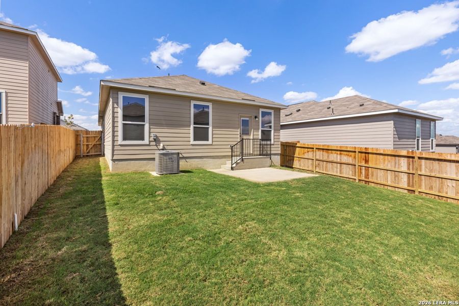 Exterior details and patio area of a home in Knox Ridge, Converse (Image 20).