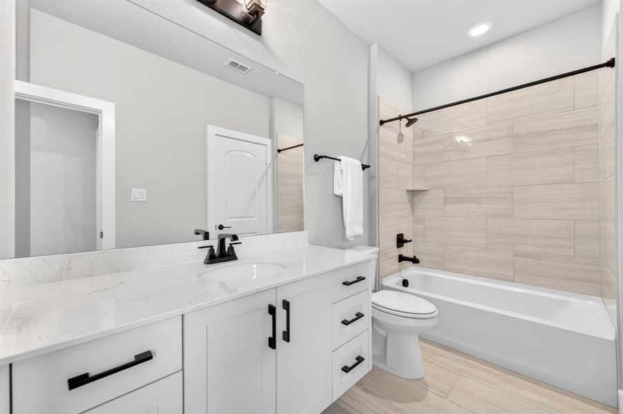 Furnished interior view inside a new home in Light Farms Graham/Reagan, Celina (Image 29).