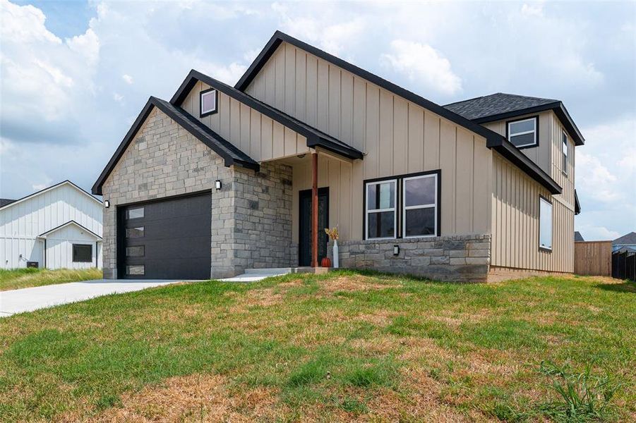 Front exterior of a new home in , Woodway, TX, highlighting curb appeal (Image 1). Front exterior of a new home in , Woodway, TX, highlighting curb appeal (Image 1).