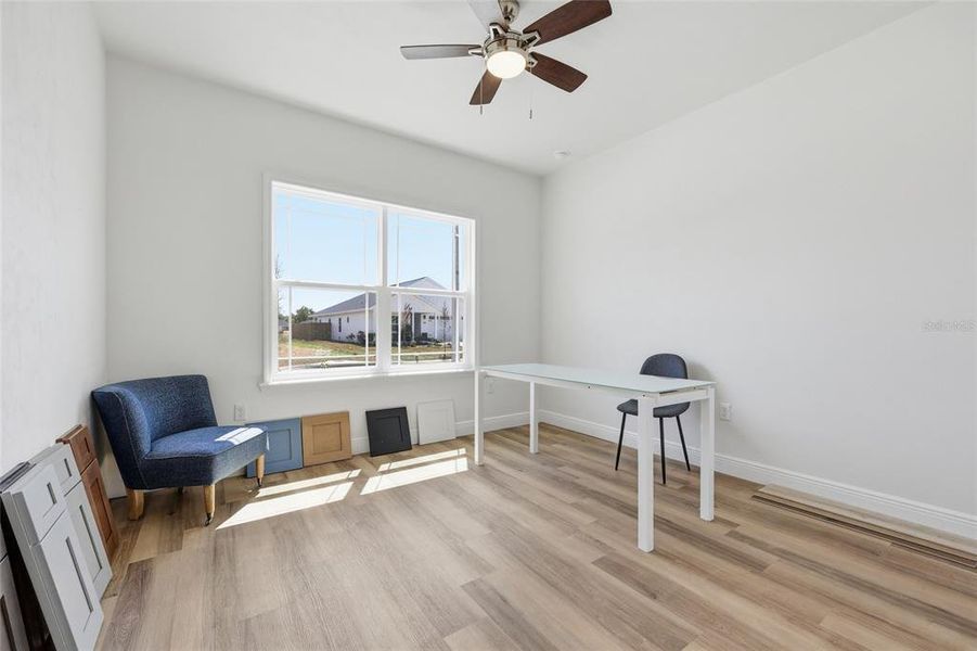 Furnished interior view inside a new home in Grand Oaks, Gainesville (Image 12).