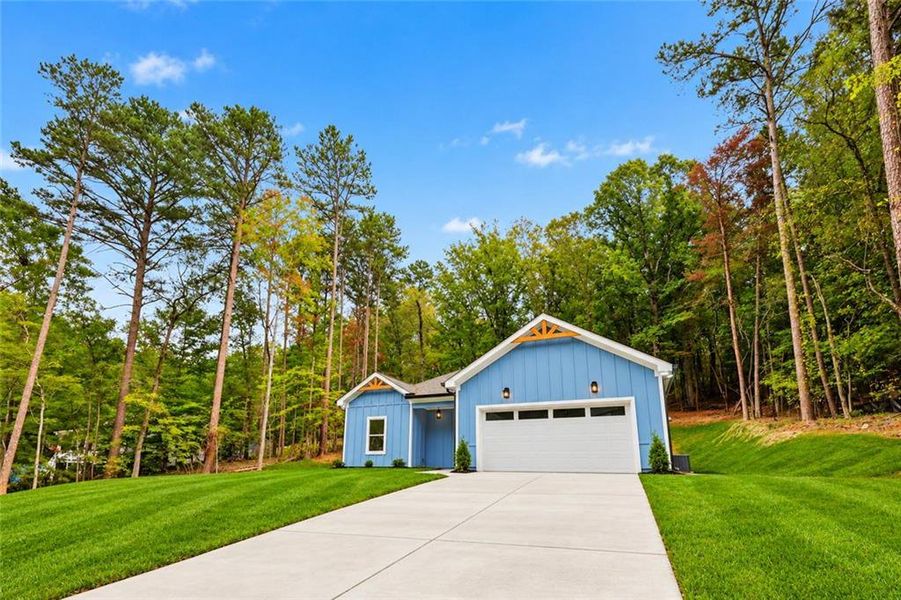 Front exterior of a new home in , Gainesville, GA, highlighting curb appeal (Image 24). Front exterior of a new home in , Gainesville, GA, highlighting curb appeal (Image 24).
