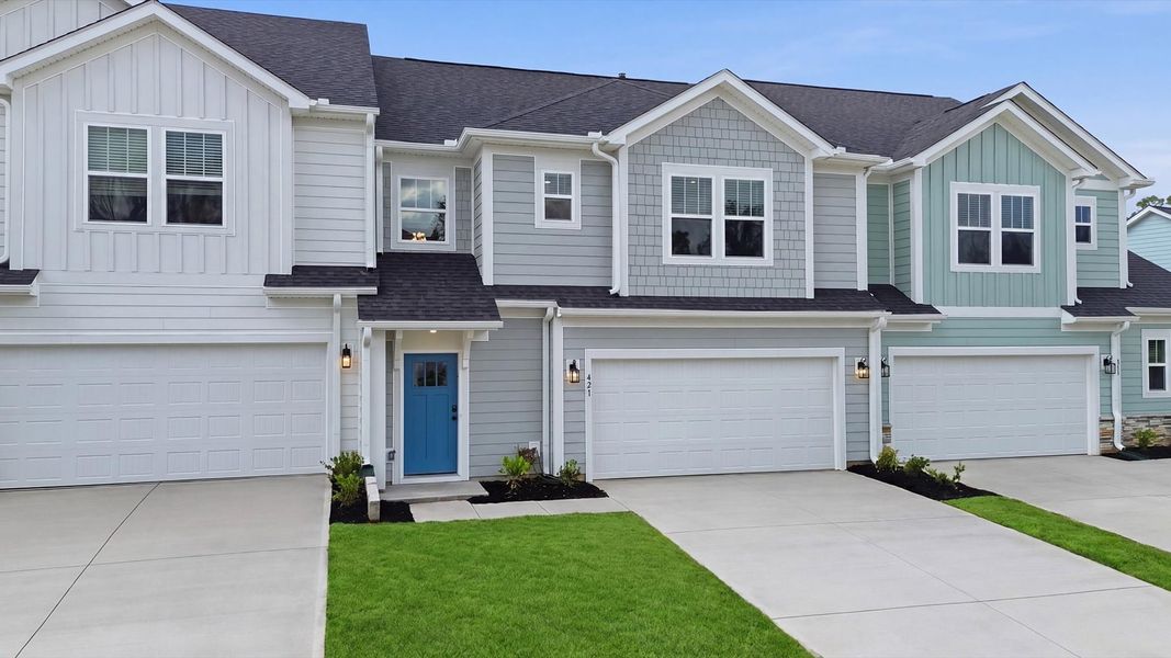 Exceptional home with tasteful exterior finishes and a thoughtfully designed façade at the Village at Midway community Exceptional home with tasteful exterior finishes and a thoughtfully designed façade at the Village at Midway community