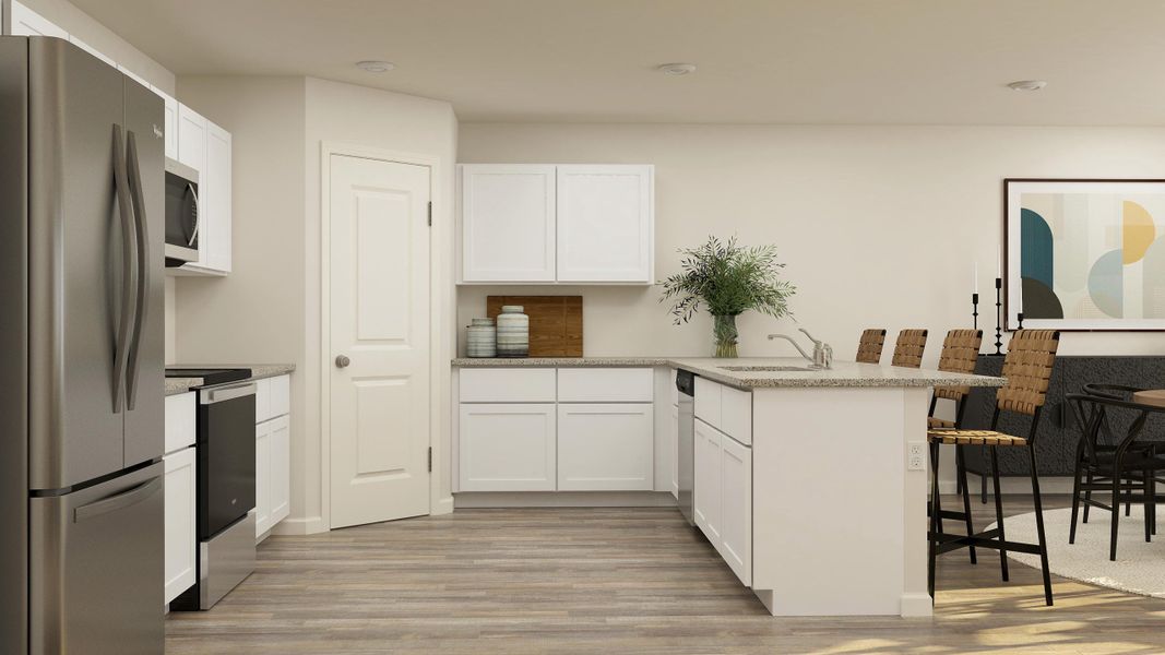 A kitchen with white cabinets. A kitchen with white cabinets.