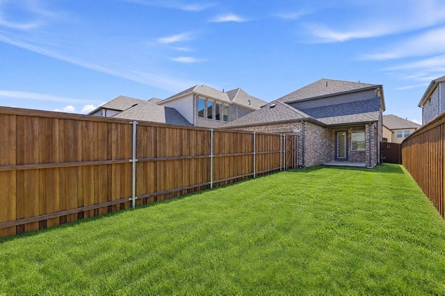 Exterior details and patio area of a home in Cross Creek Meadows, Celina (Image 4). Exterior details and patio area of a home in Cross Creek Meadows, Celina (Image 4).