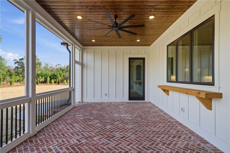 Exterior details and patio area of a home in , White (Image 3). Exterior details and patio area of a home in , White (Image 3).