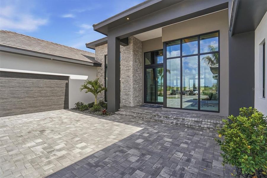 Exterior details and patio area of a home in , Sarasota (Image 25).