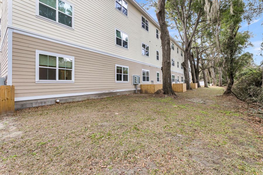 Exterior details and patio area of a home in , Johns Island (Image 21).
