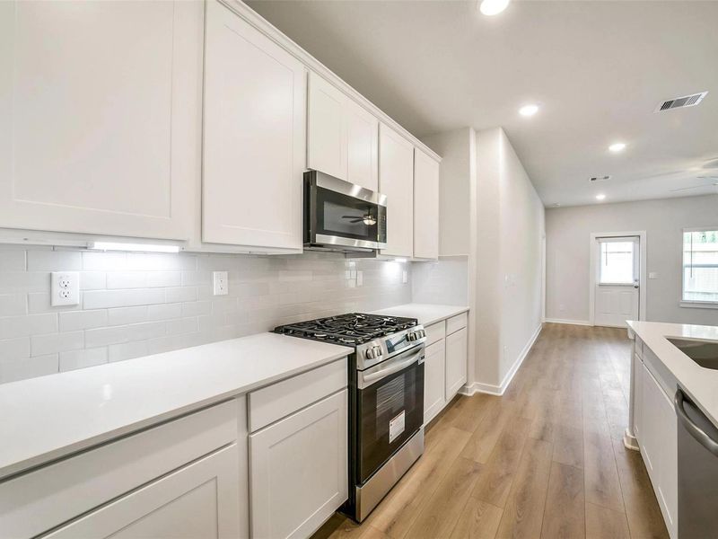 Furnished interior view inside a new home in Lakes at Black Oak, Magnolia (Image 12). Furnished interior view inside a new home in Lakes at Black Oak, Magnolia (Image 12).