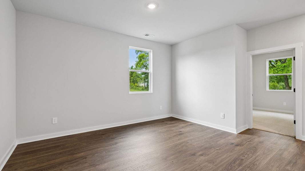 Representative unfurnished interior of a home built from the Holden by D.R. Horton in Harvest Point, Spring Hill (Image 60).