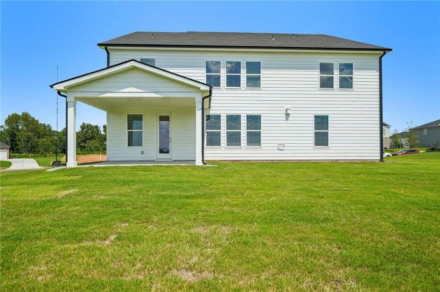 Exterior details and patio area of a home in River Pointe, Monroe (Image 4).