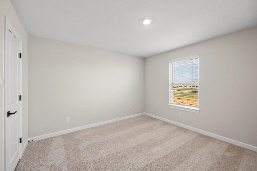 Spacious, unfurnished interior of a new home in Sunterra, Katy (Image 12).