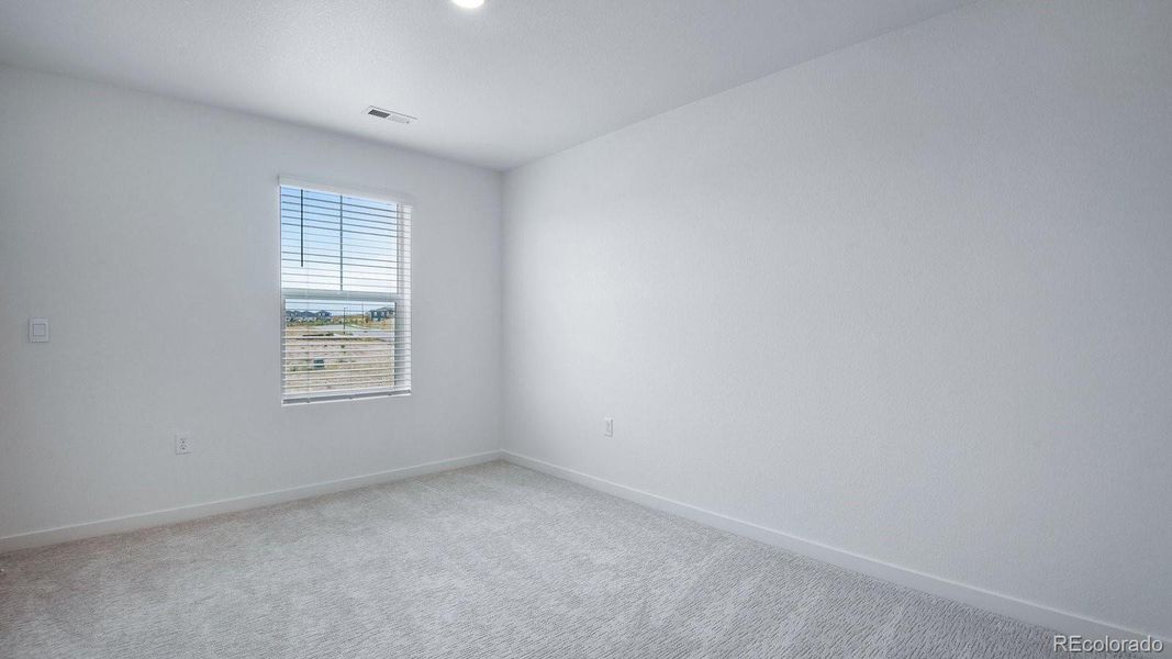 Spacious, unfurnished interior of a new home in Trails at Crowfoot, Parker (Image 21).