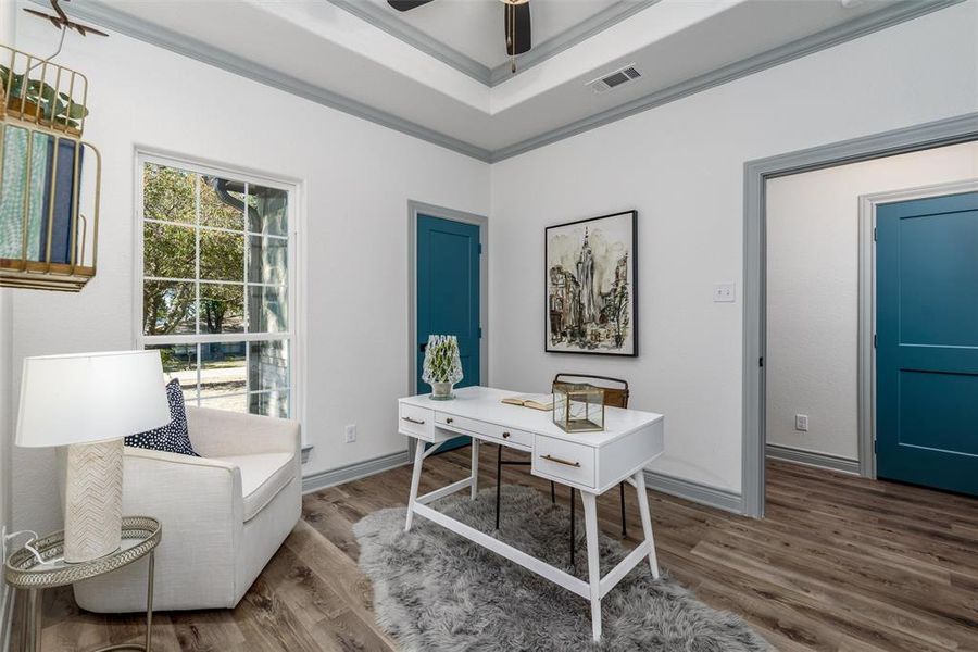 Secondary bedroom off the entryway.