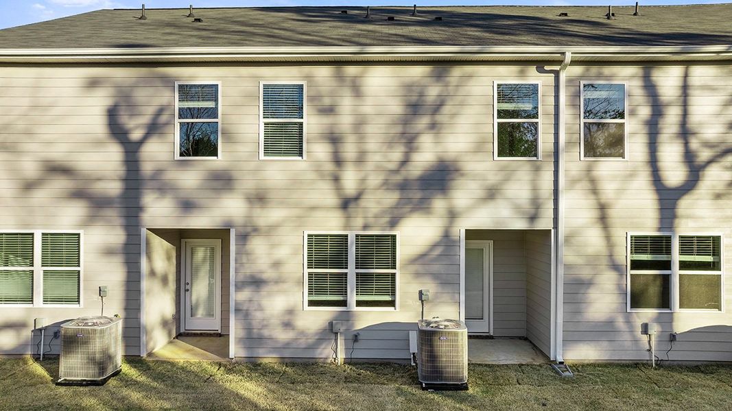 Exterior details and patio area of a home in Laurel Park Townhomes, Hephzibah (Image 3).