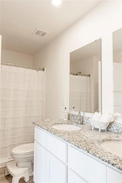 Furnished interior view inside a new home in Eagle Hammock, Eagle Lake (Image 13).