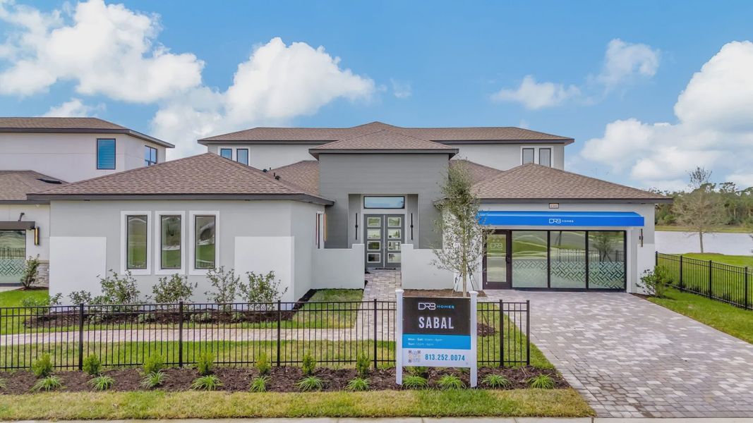 The Front Elevation of a DRB Homes Grand Sabal Model, which the home plan is offered at Serengeti in Spring Hill, FL.