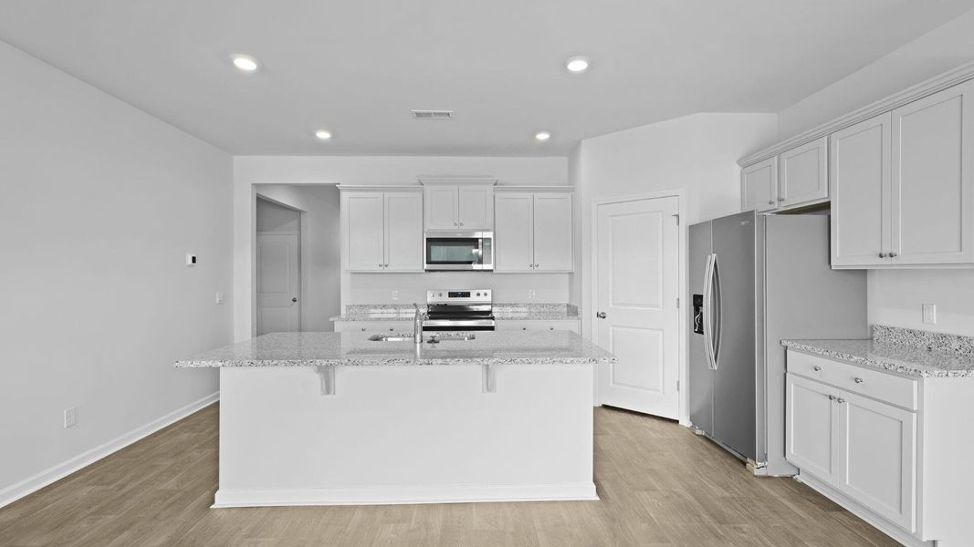 Furnished interior view inside a new home in The Ranch, Holly Hill (Image 7).