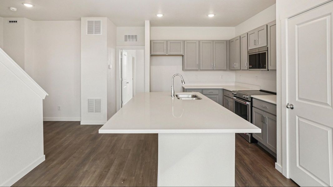 Furnished interior view inside a new home in Windler Townhomes, Aurora (Image 15). Furnished interior view inside a new home in Windler Townhomes, Aurora (Image 15).