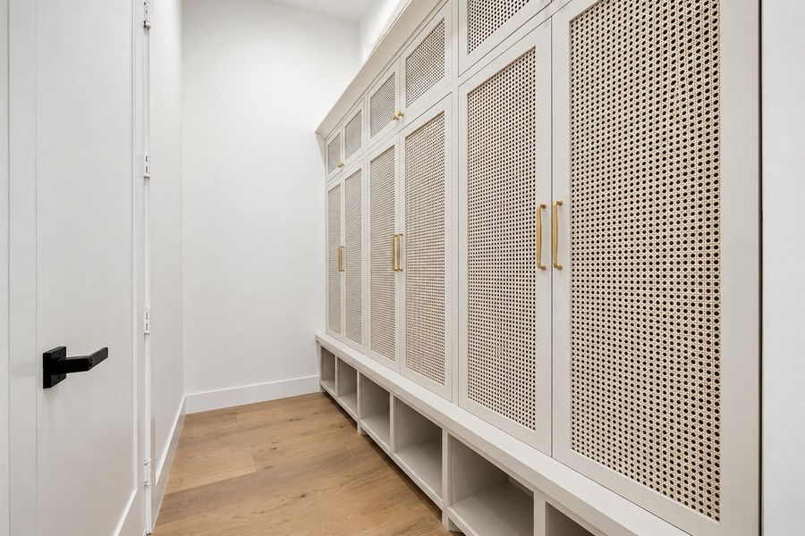 Large mudroom with custom storage lockers