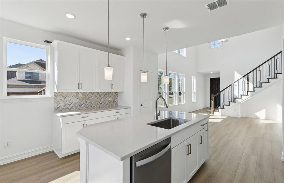 Spacious kitchen with eat-in bartop island Spacious kitchen with eat-in bartop island