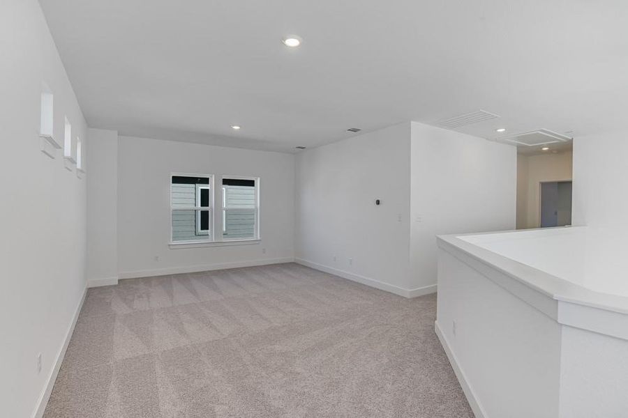 Retreat  [Photo shown is from a completed home with the same floorplan and similardesign selections.]